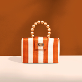 GOLD BEAD HANDLE STRAW CLUTCH